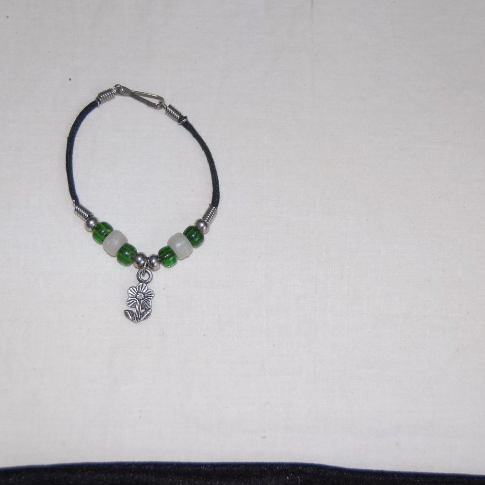 Green/White Bead Bracelet With Leather Closure and Flower Charm